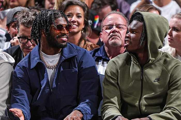 Shedeur Sanders and Travis Hunter enjoying Denver Nuggets opener at Ball Arena